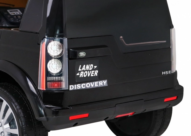 Land Rover Discovery Auto elettrico per bambini nero + telecomando + ruote EVA + avvio lento + radio MP3