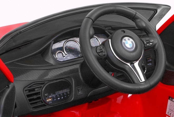 BMW X6M Auto elettrico per bambini rosso + telecomando + EVA + avvio lento + pannello audio + LED