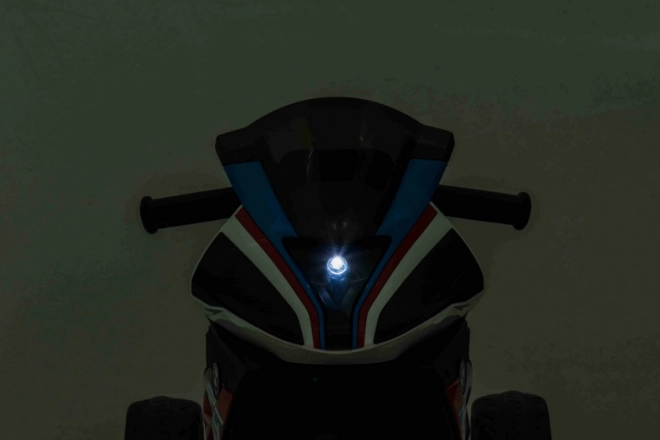 BMW HP4 Motocicletta per bambini a batteria Blu + 3 ruote + LED + MP3 USB + Pelle Eco