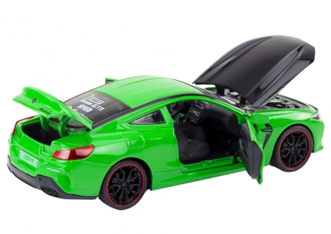 Auto sportiva verde in metallo con elementi apribili 1:24