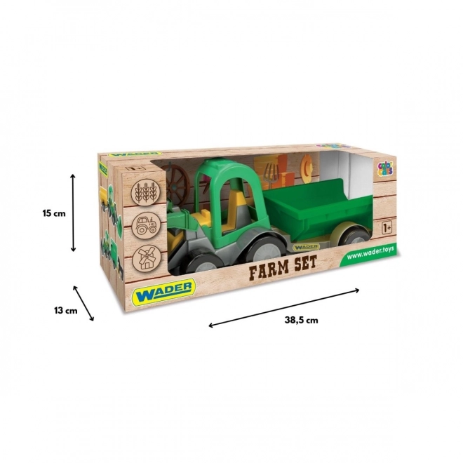 Trattore con caricatore e rimorchio Wader