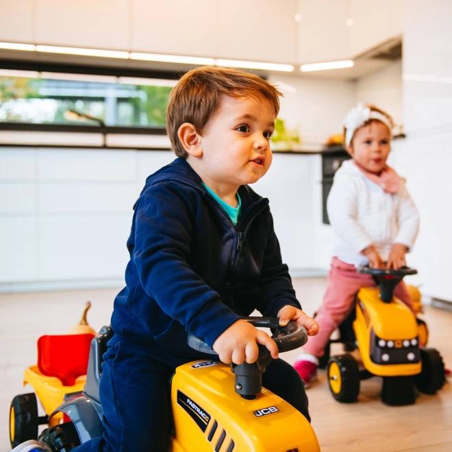 Odrážedlo Baby JCB giallo con rimorchio e pala