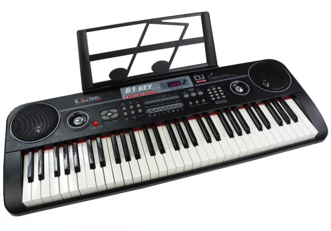 Keyboard musicale nero con microfono e alimentatore