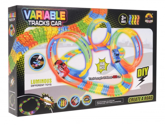 Pista da corsa fluorescente con auto a LED per bambini