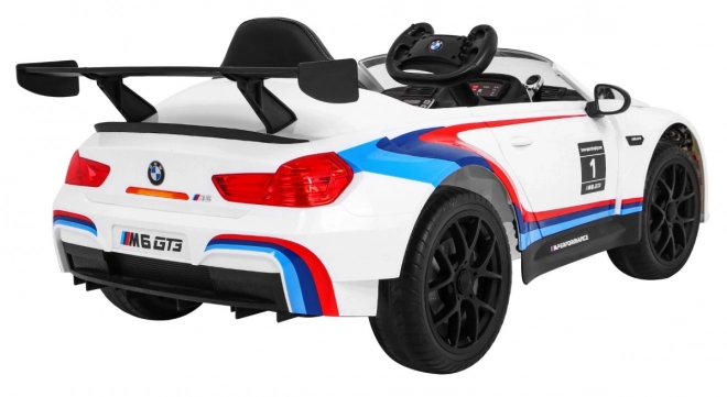 BMW M6 GT3 Auto a batteria per bambini Bianco + ventilazione + suoni MP3 Luci + telecomando