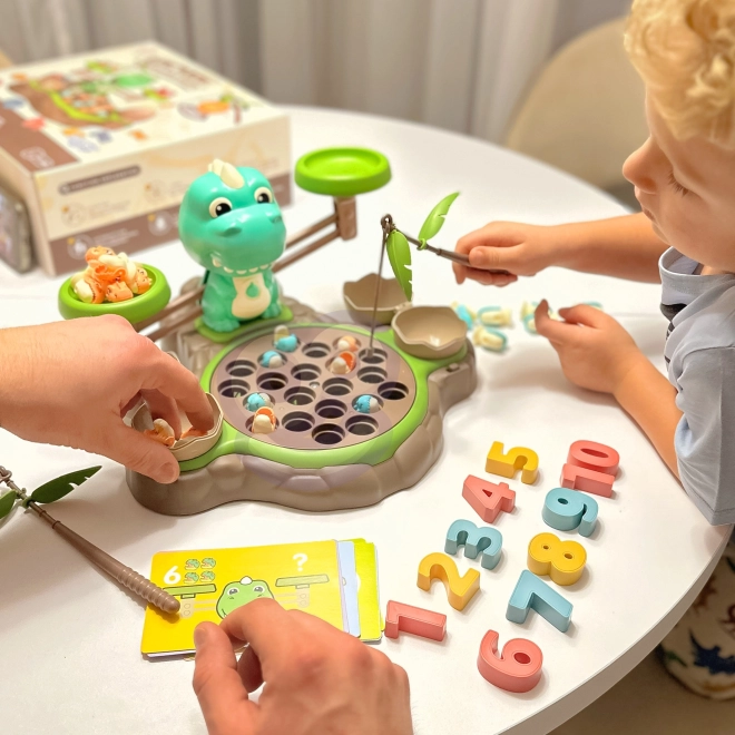Gioco educativo Dinozaur con bilancia e cattura di WOOPIE