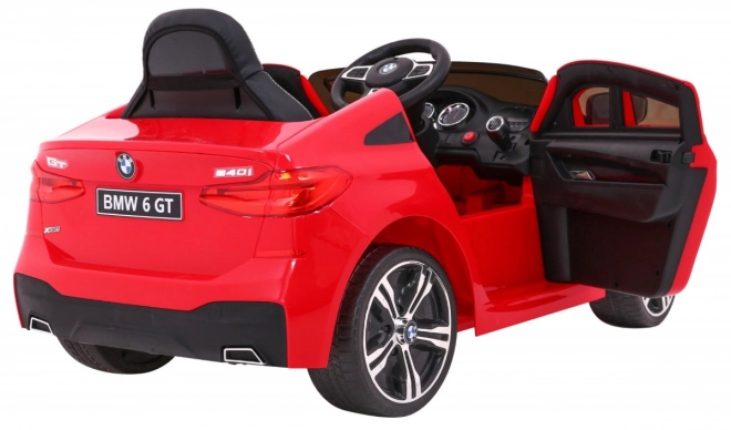 BMW 6 GT Auto a batteria rosso + telecomando + partenza lenta + EVA + cinture + LED MP3