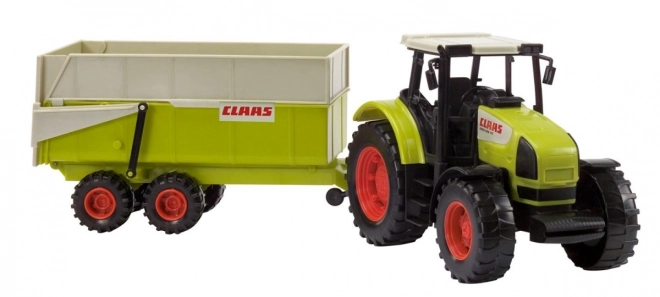 Trattore Claas Ares con rimorchio inclinabile