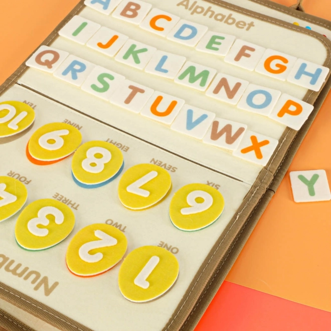 Valigia sensoriale Montessori con dinosauri