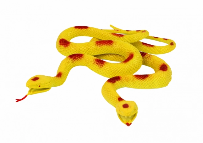 Serpente di gomma giallo con macchie rosse