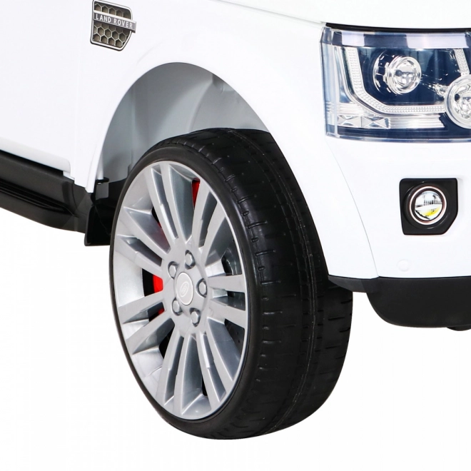 Land Rover Discovery Auto elettrico per bambini bianco + telecomando + ruote EVA + avvio lento + radio MP3