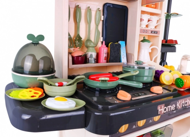 Cucina multifunzione per bambini con rubinetto e piano cottura interattivo