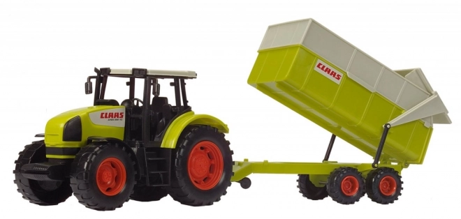 Trattore Claas Ares con rimorchio inclinabile