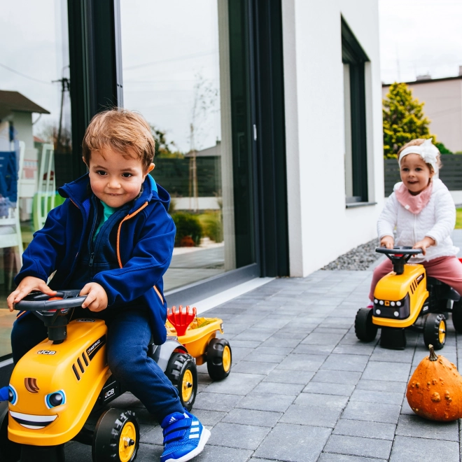 Odrážedlo Baby JCB giallo con rimorchio e pala