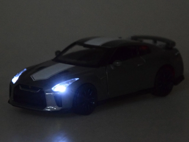 Auto in metallo Nissan GT-R 1:32 con porte apribili