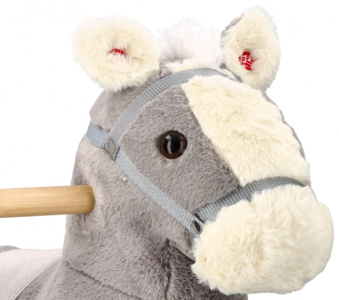 Cavallo a dondolo di peluche