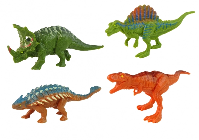 Veicolo con tema dinosauro con rimorchio e 4 dinosauri