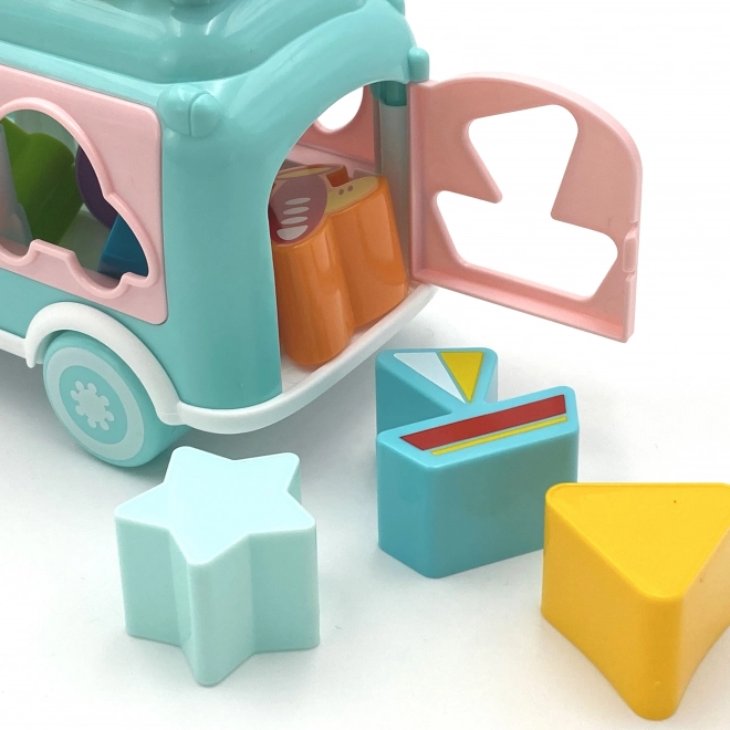 Woopie auto musicale rosa con elementi di smistamento e piatti