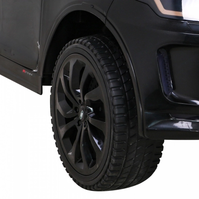 Land Rover Discovery Sport per bambini nero + telecomando + avvio lento + funzione altalena + MP3 LED