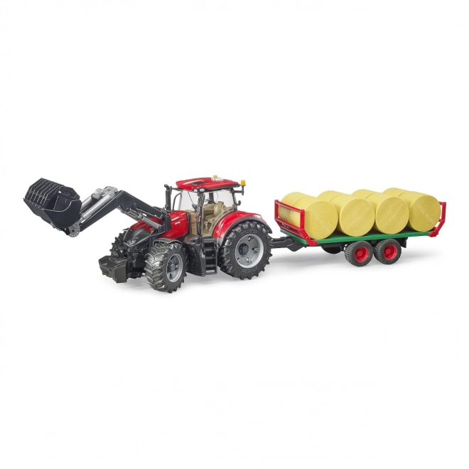 Trattore Bruder Case IH Optum 300 CVX con caricatore frontale e trasportatore per balle