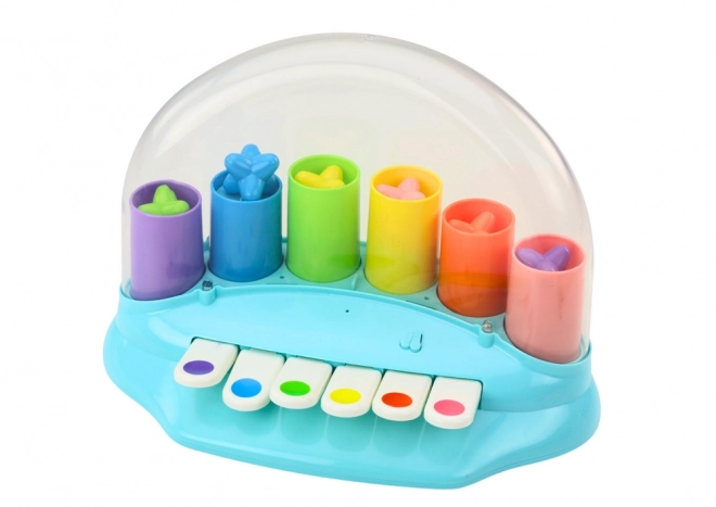 Pianola interattiva con stelle pop-up blu