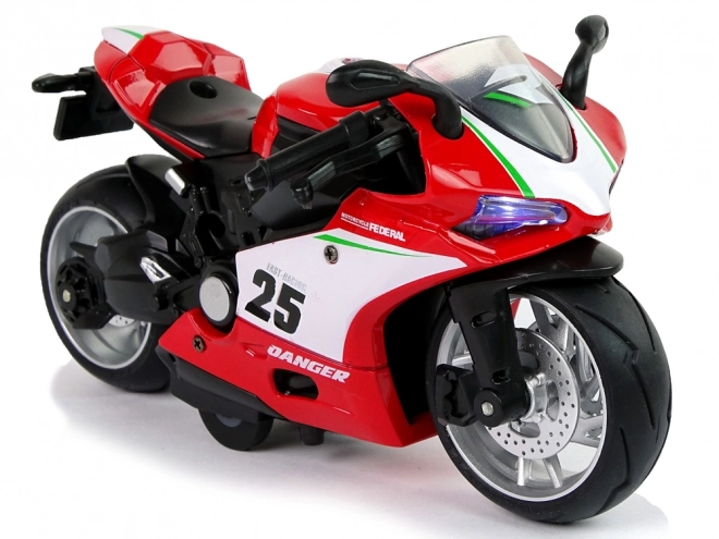 Moto sportiva rossa con luci e suoni 1:12