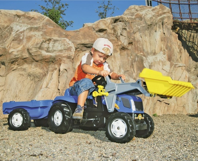 Trattore a pedali con rimorchio e pala Rolly Toys blu New Holland