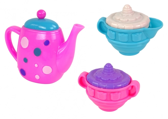 Set da tè per bambini con tazze, piatti e posate viola