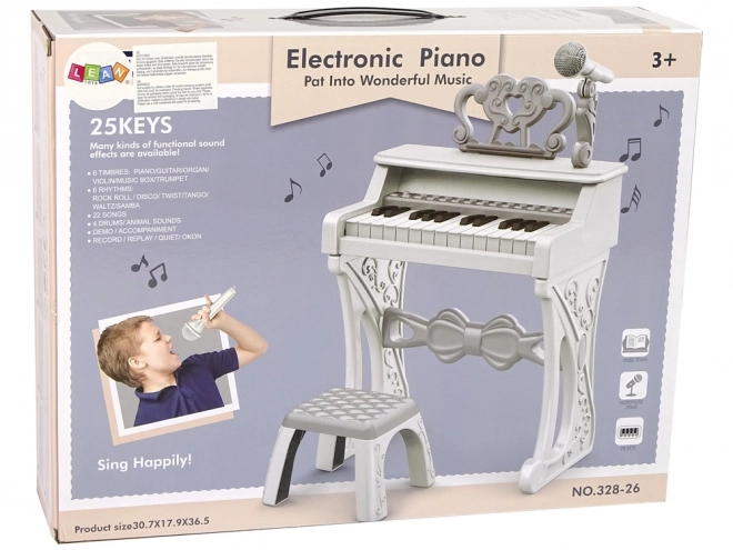 Pianola elettrica turchese con sedia e 25 tasti