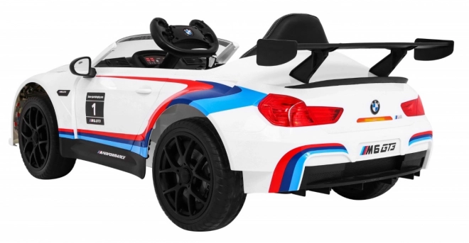 BMW M6 GT3 Auto a batteria per bambini Bianco + ventilazione + suoni MP3 Luci + telecomando