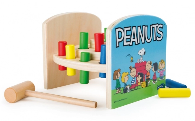 Zatloukačka in legno con Peanuts