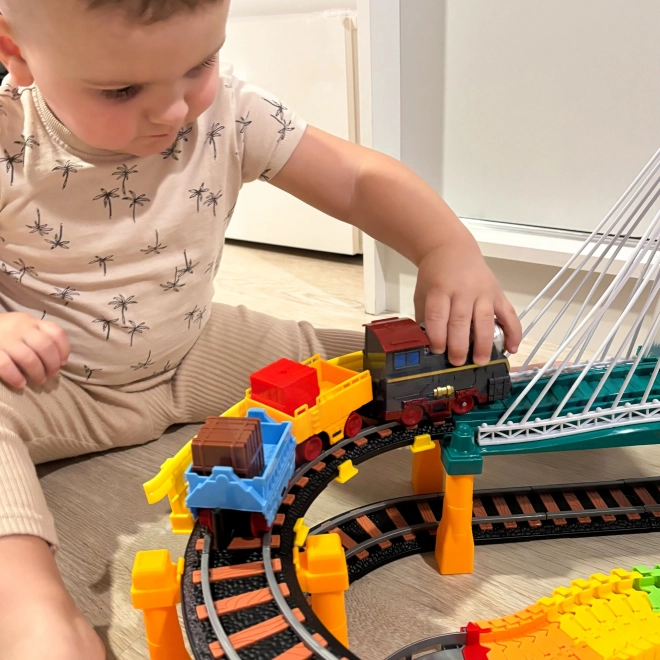 Set pista da corsa e trenino elettrico 2 in 1