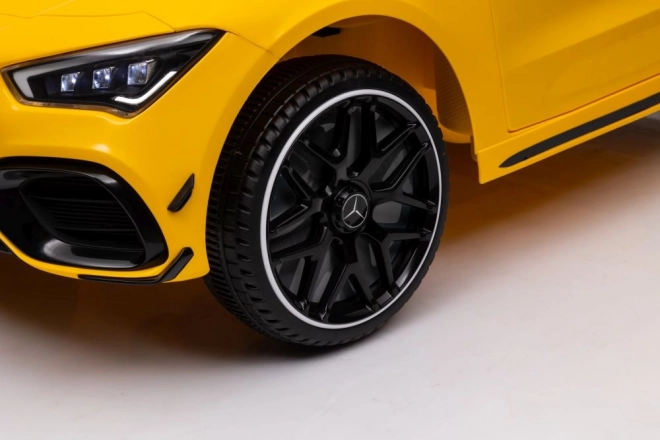 Auto elettrico per bambini Mercedes CLA 45s AMG giallo 4x4