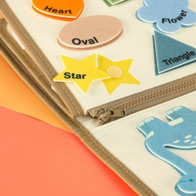 Valigia sensoriale Montessori con dinosauri