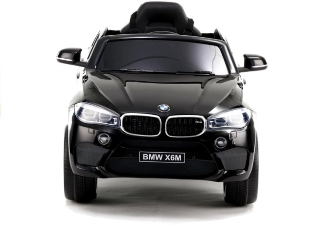 Auto elettrica BMW X6 nero verniciato