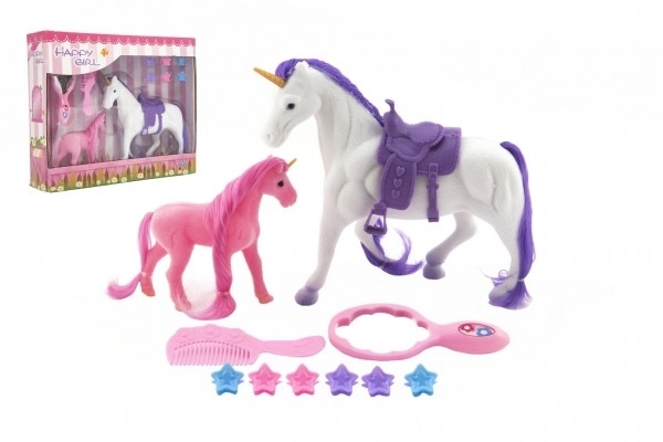 Unicorno con sella e puledro in plastica con accessori