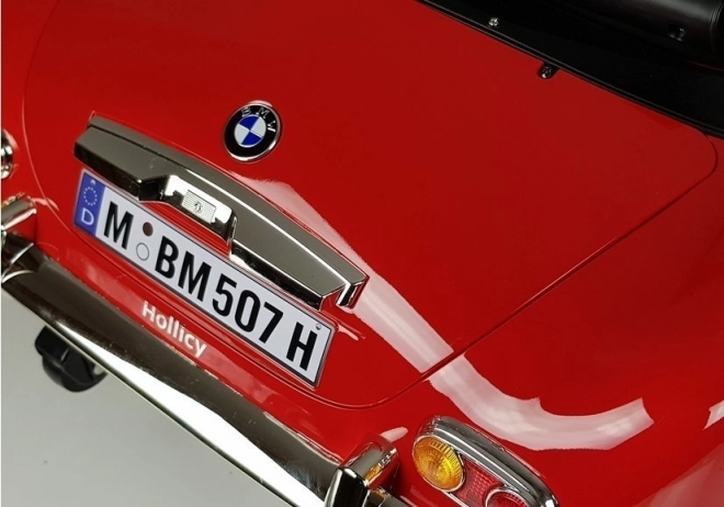 Auto elettrica BMW retro rosso verniciato