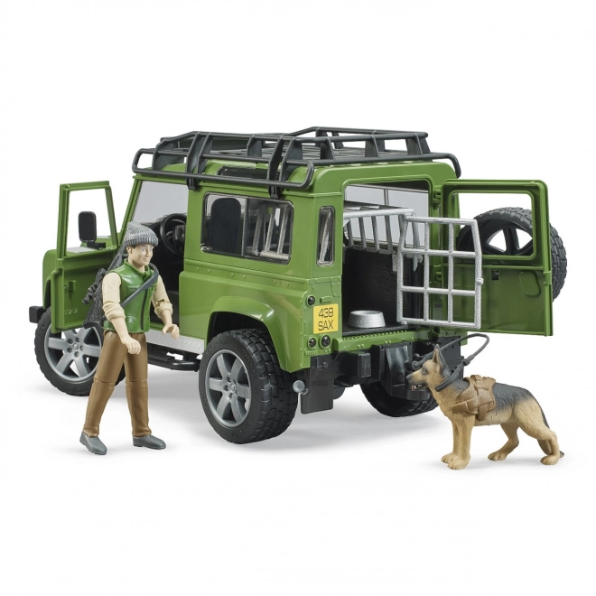 Land Rover Defender con Figurine Cacciatore e Cane di Bruder