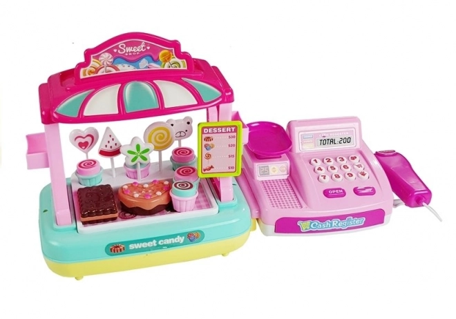 Cassa del registratore di cassa per bambini con stand di dolciumi