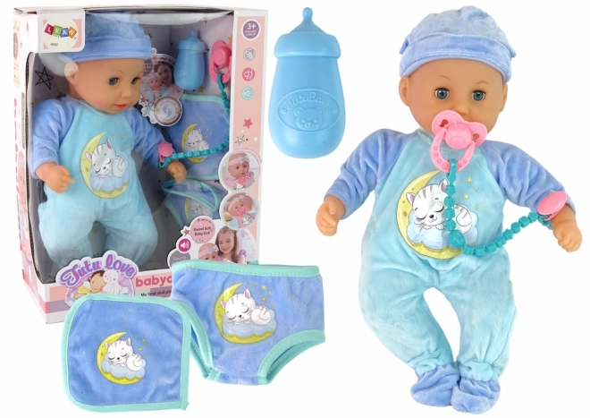 Bambola Neonato Suoni con Pigiama Blu e Accessori