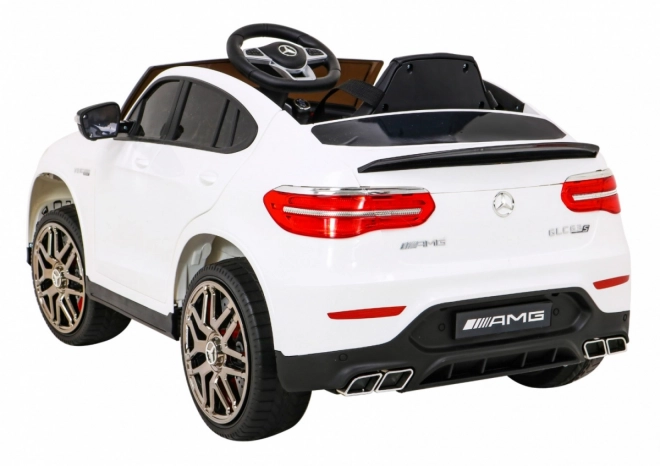 Mercedes Benz GLC63S per bambini bianco + telecomando + trazione 4x4 + MP3 LED + EVA + avvio lento