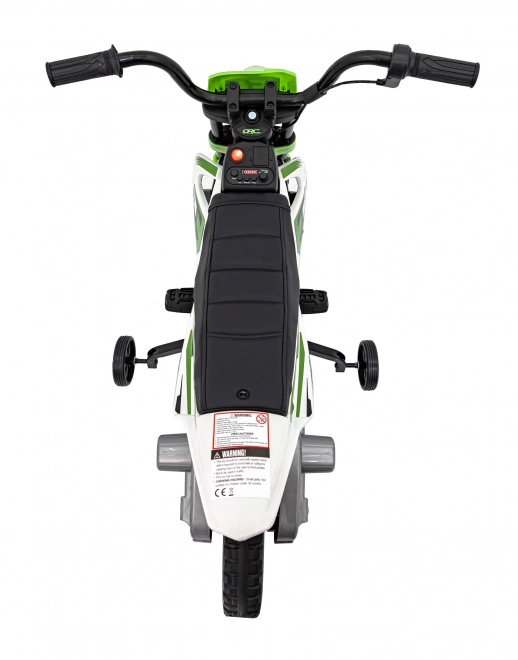 Moto verde per bambini a batteria con pannello audio e ruote in EVA