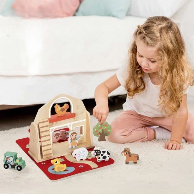 Fattoria impilabile in legno Tooky Toy con figurine di animali