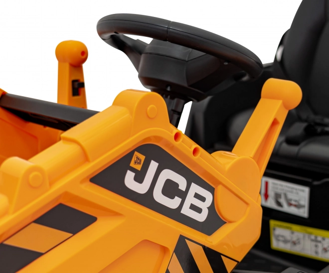 Veicolo JCB con escavatore giallo
