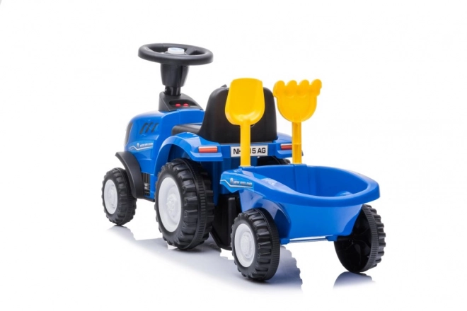 Trattore cavalcabile New Holland blu