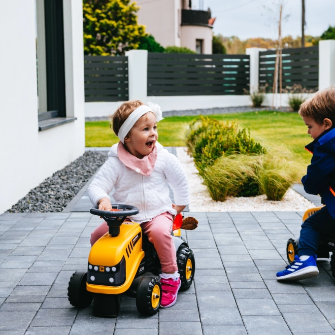 Odrážedlo Baby JCB giallo con rimorchio e pala