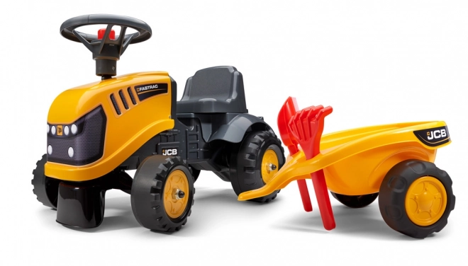 Odrážedlo Baby JCB giallo con rimorchio e pala