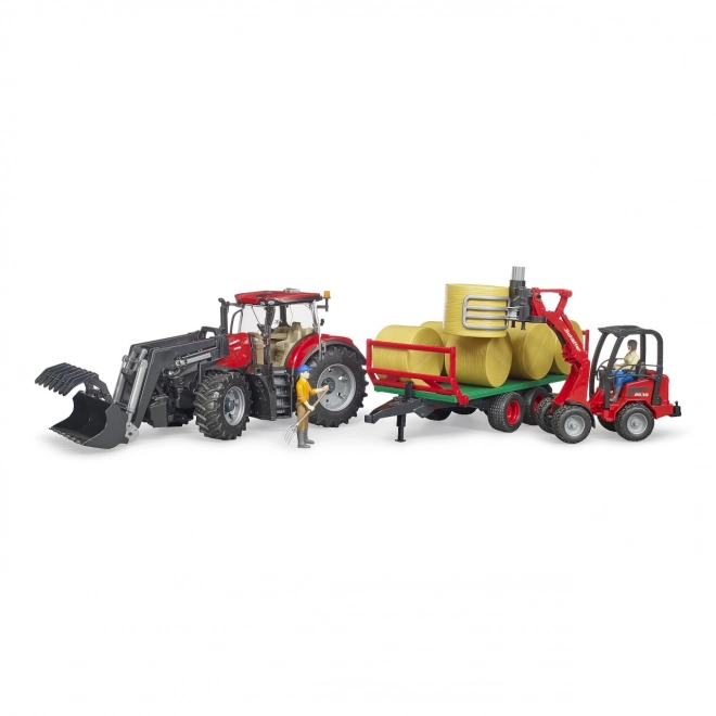 Trattore Bruder Case IH Optum 300 CVX con caricatore frontale e trasportatore per balle