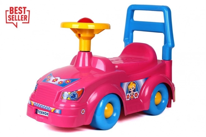 Auto cavalcabile rosa con clacson