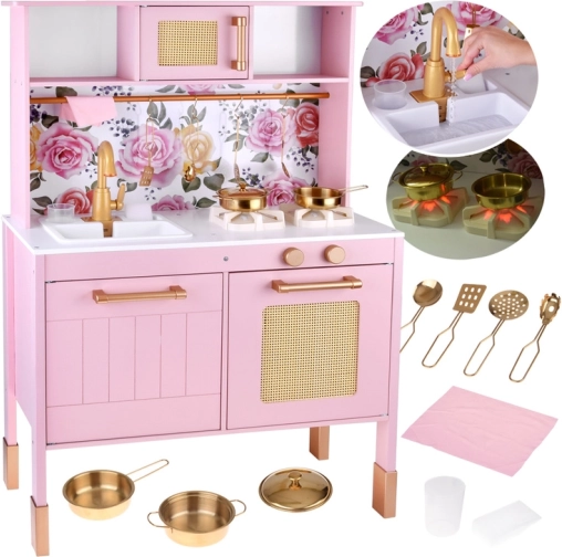 Cucina giocattolo in legno rosa con fornelli luminosi e accessori dorati